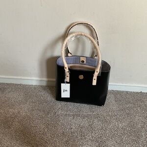 Four piece Jessica Moore purse set